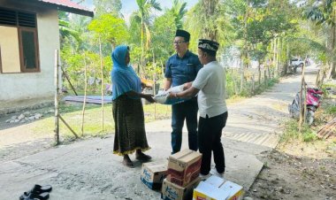 Yusdi Bacalon Bupati Aceh Jaya Bantu Korban Kebakaran di Kec.Pasie Raya